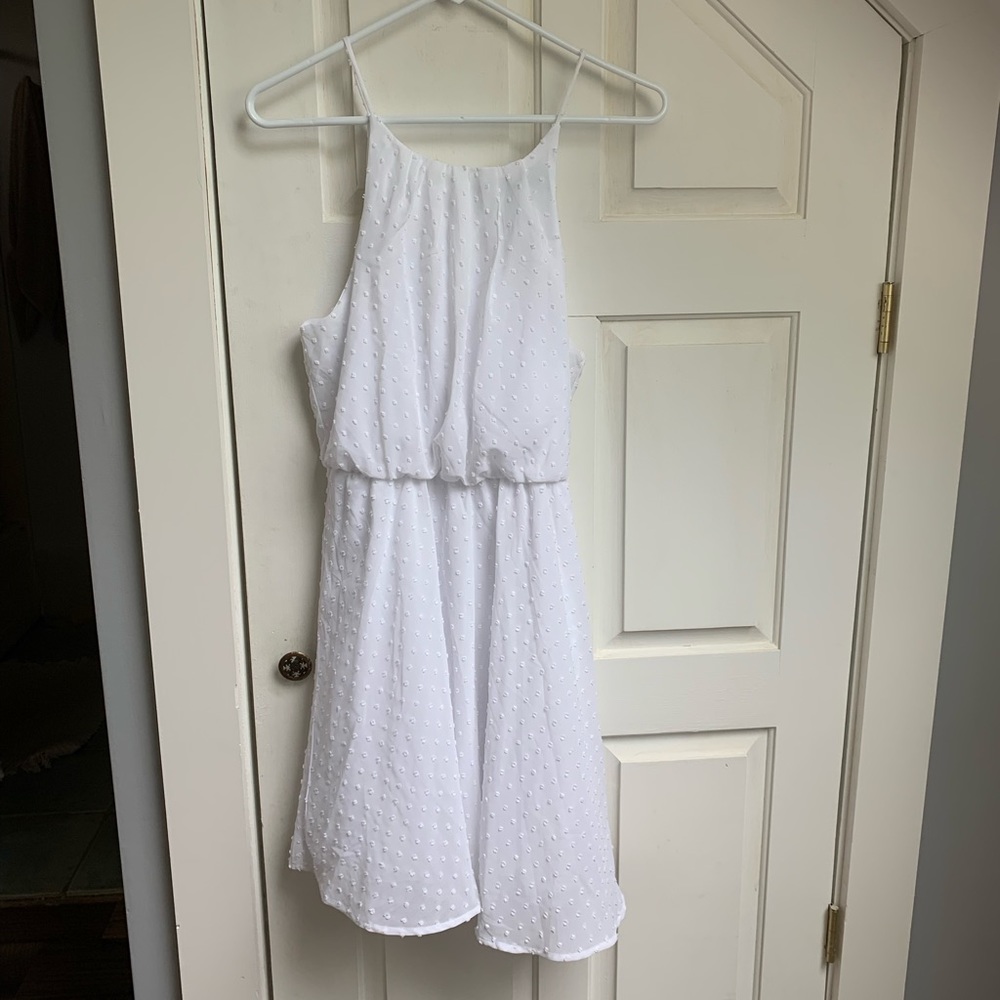Francescas white dress.